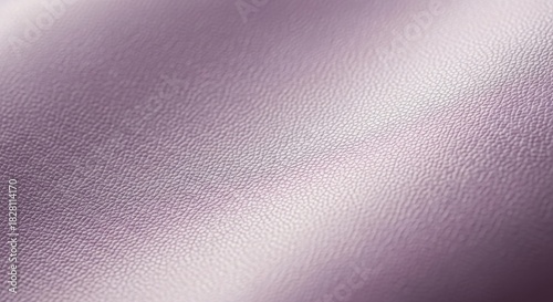 Close-up of textured purple leather background with soft lighting