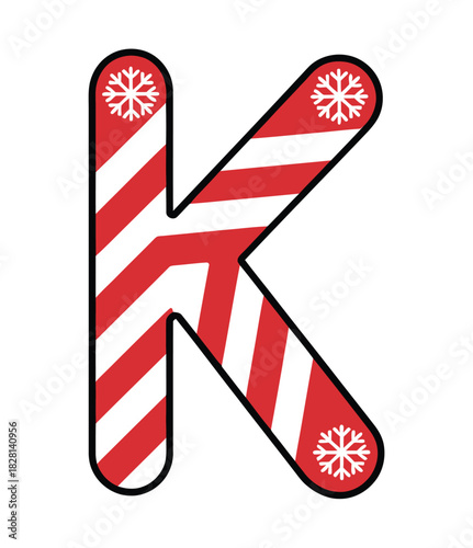 A red and white striped letter K with snowflakes, resembling a candy cane.