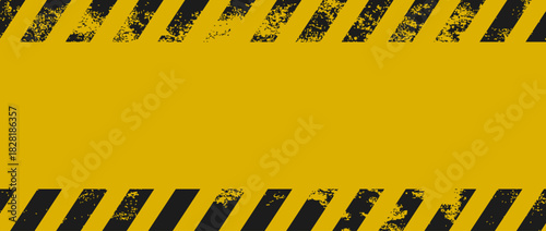 Grunge texture in black and yellow hazard style. Abstract warning background for poster, banner, sign, industrial design, and safety themed graphics.