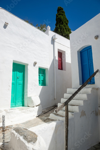Fototapeta Naklejka Na Ścianę i Meble -  Jumbled steps and alleyway in a typical traditional sugar cube village on Greek Island of Serifos in the Cyclades