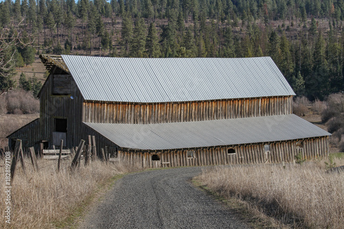 photo of large old wooden barn on a farm or ranch in Idaho