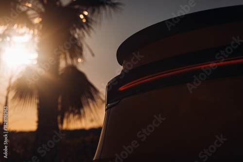Modern car rear taillight lamp close-up view. The clean trunk of modern car