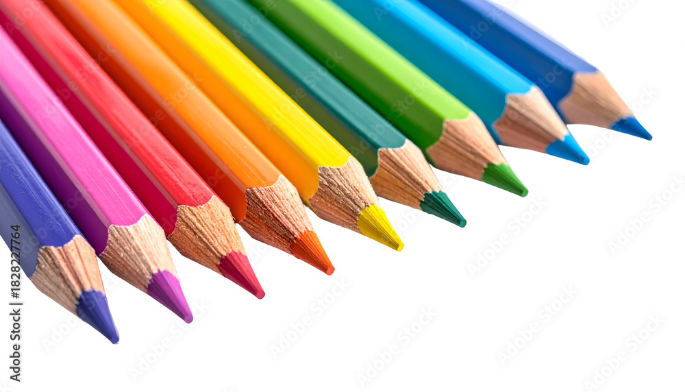 Fototapeta premium Close-up of rainbow-colored pencils angled on a dark background