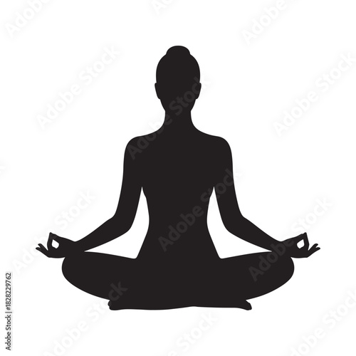 Silhouette of a person meditating in a lotus pose
