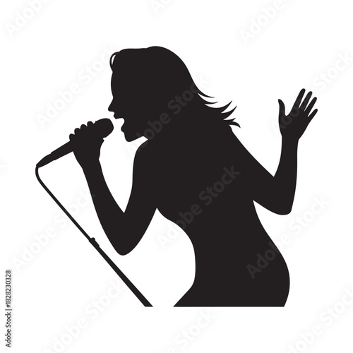 Silhouette of a female singer performing with a microphone