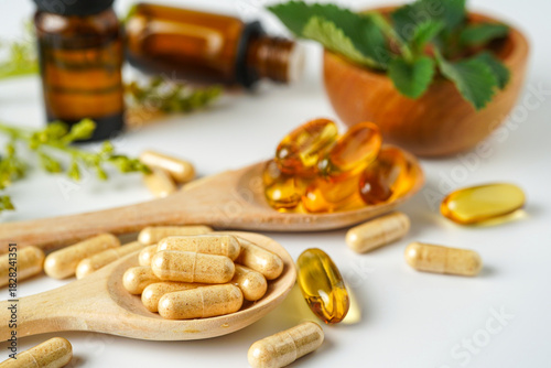 Alternative medicine herbal organic capsule vitamin E omega 3 fish oil drug herbs leaf natural