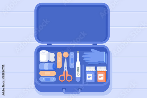 Top view of an open first-aid kit containing essential medical supplies such as bandages, gauze, scissors, a thermometer, and medicine bottles. Emergency care illustration concept.