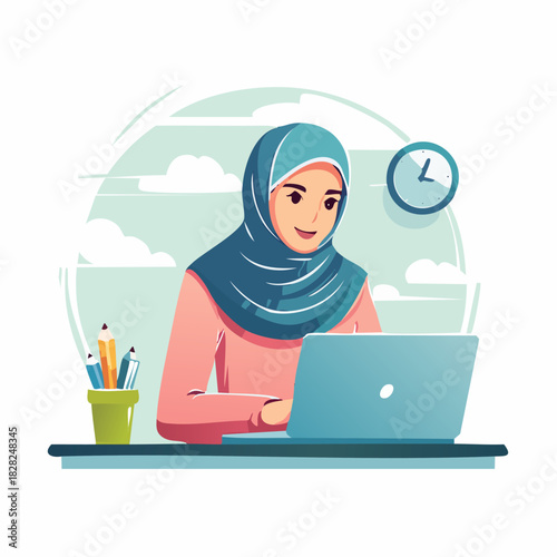 Female student in hijab working on laptop at desk.