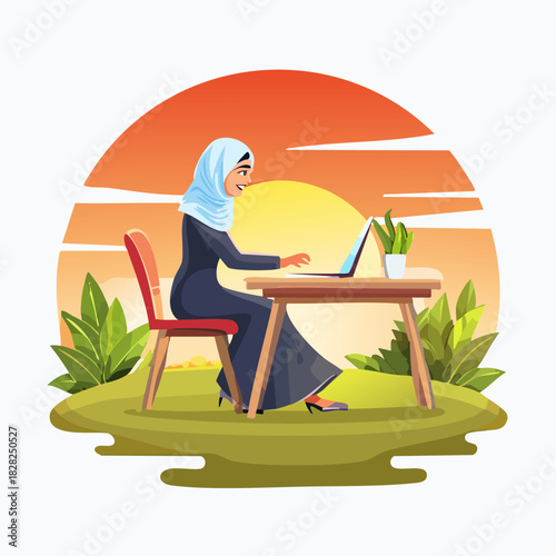 Woman in hijab working on laptop outdoors at sunset.