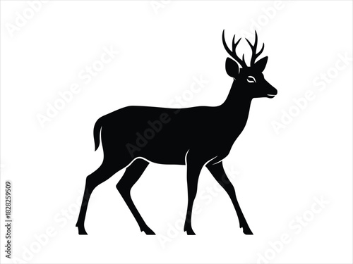 Silhouette of a majestic stag with antlers, standing gracefully