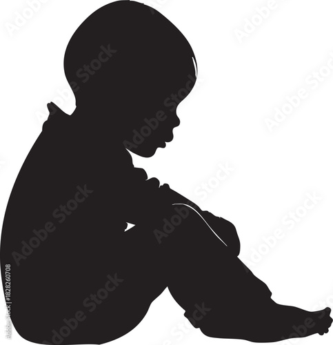 Silhouette d'un bébé assis tete baissée