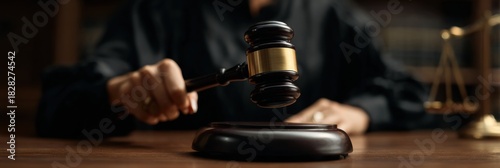 Wallpaper Mural Woman Judge Preparing to Bang Gavel on Sounding Block in Courtroom During Legal Proceedings Torontodigital.ca