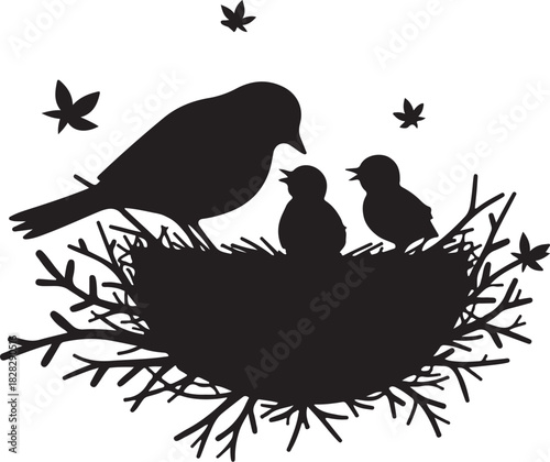Black silhouette of a bird family in a nest with leaves