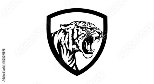 Black and white illustration of a roaring tiger's head inside a shield