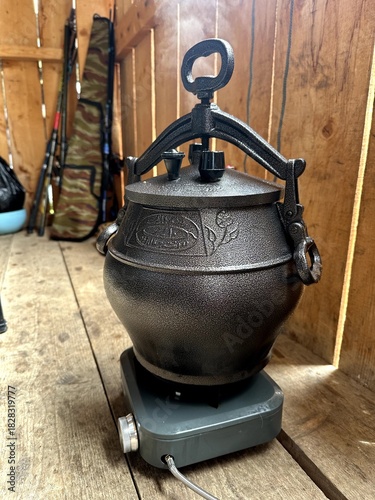 Traditional heated kettle creating nostalgic homestead scene
