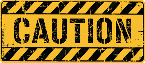 Caution grunge warning sign with black and yellow hazard stripes