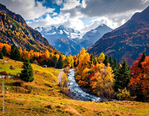 Scenic autumn landscape of mountains, colorful trees and a flowing river
