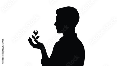 Silhouette of a man holding a delicate seedling, symbolizing growth and new beginnings