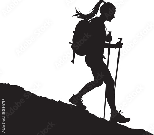 Silhouette of woman hiking uphill with backpack and poles