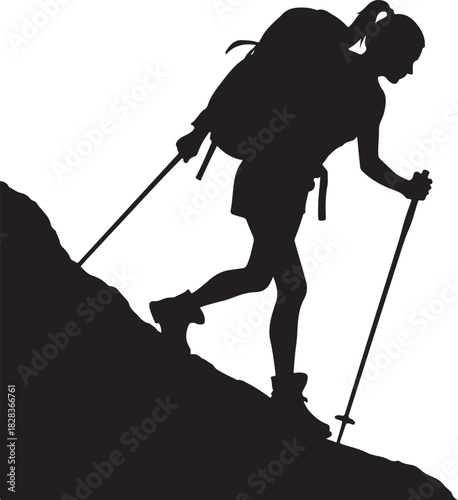 Silhouette of woman hiking uphill with backpack and poles