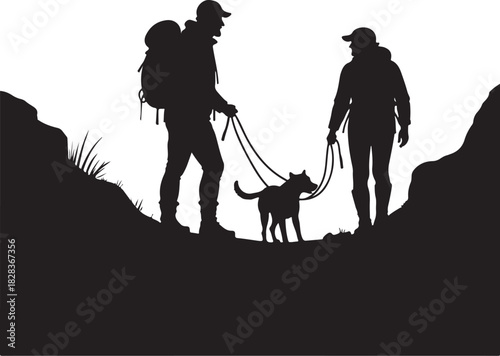 Two hikers and dog silhouette on rocky terrain hiking
