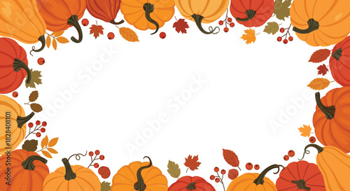 Autumnal frame border with a variety of colorful pumpkins, fall leaves, and berries, with copy space in the center.