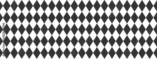 Harlequin seamless pattern. Geometric background with with black and white rhombus. Circus or masquerade ornament