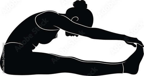 Silhouette of a woman in a seated forward-bend yoga pose