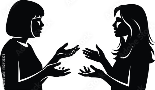 Silhouette of two women in conversation