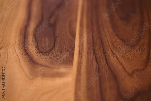Closeup of real black walnut wood texture with natural grain