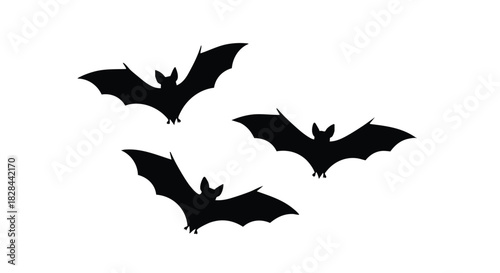 Three Bats Silhouetted Against a White Background Ideal for Halloween Designs and Spooky Invitations with Dynamic Black and White Contrast