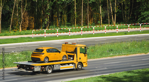 Wallpaper Mural Yellow car being transported on flatbed truck Torontodigital.ca