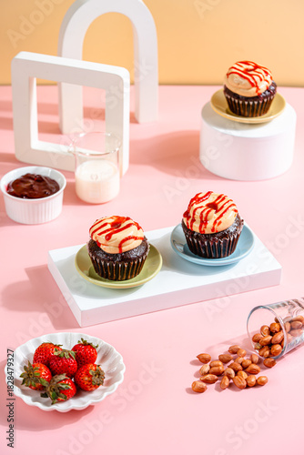 A Cupcake is a small, single-serving cake baked in a small cup-shaped mold, often lined with paper