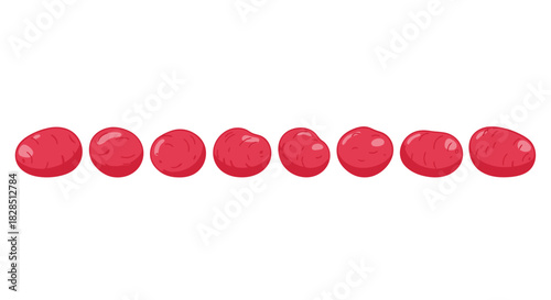 Row of bright red translucent jelly candies arranged in a line