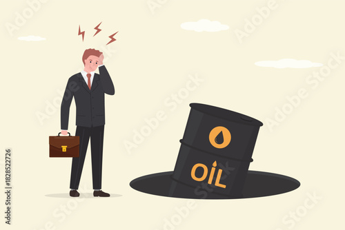 Oil barrel fell into pit. Danger. Unhappy investor looking how oil price falls down. Low demand. Sale of petroleum products and fuels. Commodities price crisis,