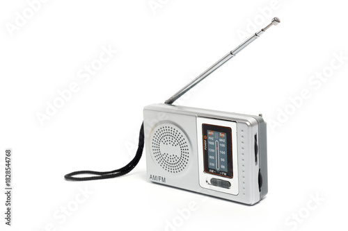 Portable battery-powered AM/FM radio photographed against a white background.