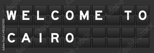 Black color analog flip board with word welcome to cairo on gray background