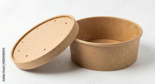 Kraft paper food bowl with ventilated lid on white background, eco friendly disposable container