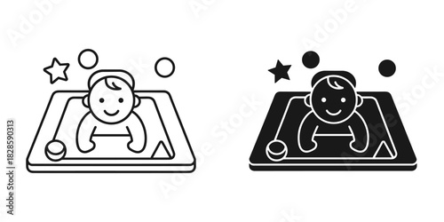 Delightful baby playing joyfully on a playmat with toys for adorable childhood memories and learning