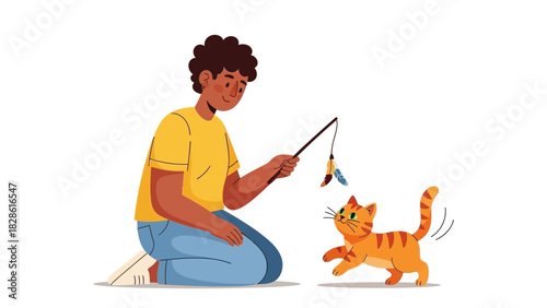 A young person plays with a playful cat using a feathered toy on a stick, fostering companionship and joy