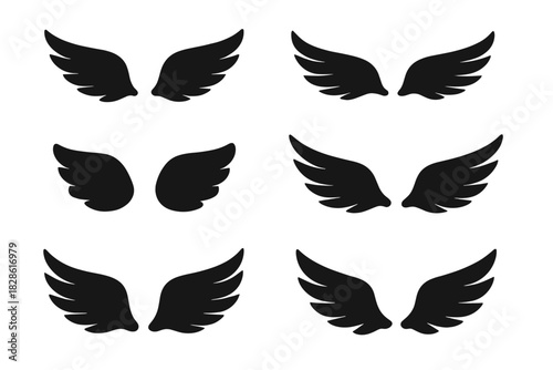 Diverse collection of stylized black wings in silhouette graphic elements