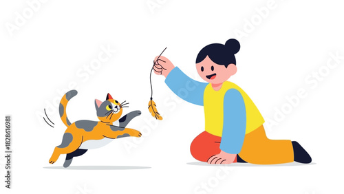 A playful calico cat leaps for a feather toy held by a person playing with their pet