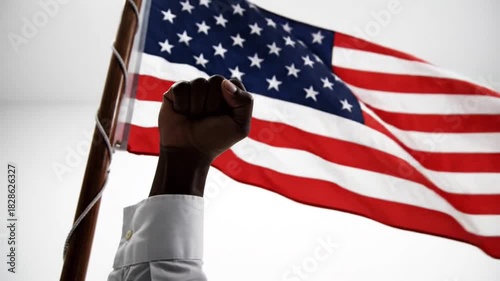 Symbol of Freedom Raised Fist in Front of American Flag