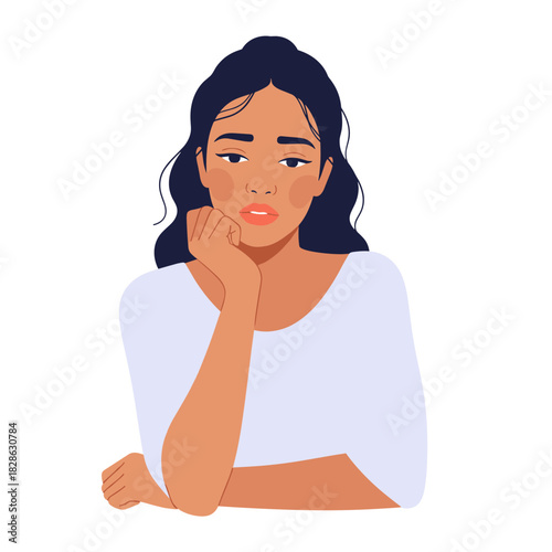 Pensive biracial woman resting chin on hand with thoughtful expression  