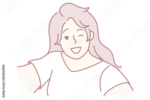 woman smiling directly at camera holding arm out for selfie, approachable personal branding moment with bright