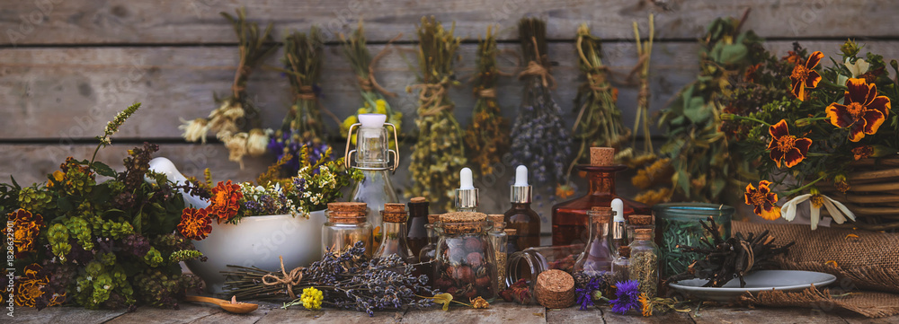 Fototapeta premium Medicinal herbs and tinctures homeopathy. Selective focus.