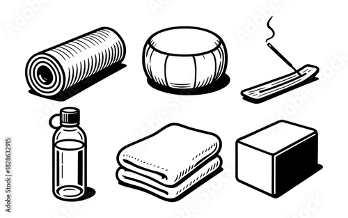 Monochrome yoga set with mat, bolster, and incense holder