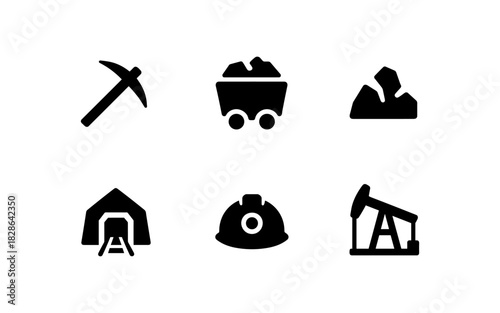 Mining industry icons: tools, equipment, and symbols in black silhouette style