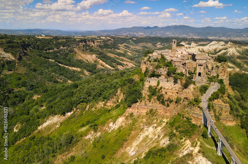 Approaching medieval town of Civita di Bagnoregio from a drone, Italy.