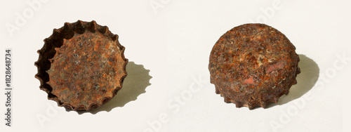 Rusty Bottle Caps On Clean White Background, Textured Metal Art, Old Rustic Industrial Look, Weathered Closeup